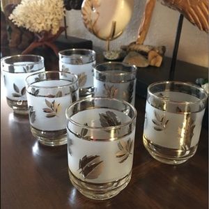 Set of six silver leaf short glasses.